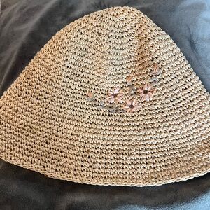 Elegant Tan Straw Hat with Floral Accents